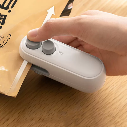Dobshow® 2-in-1 Mini Heat Sealer -  Seal & Cutter
